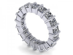 A princess cut diamond eternity ring in white gold.