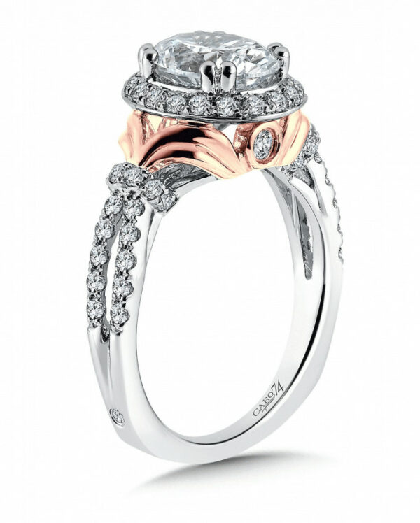 A rose and white gold engagement ring with diamonds.